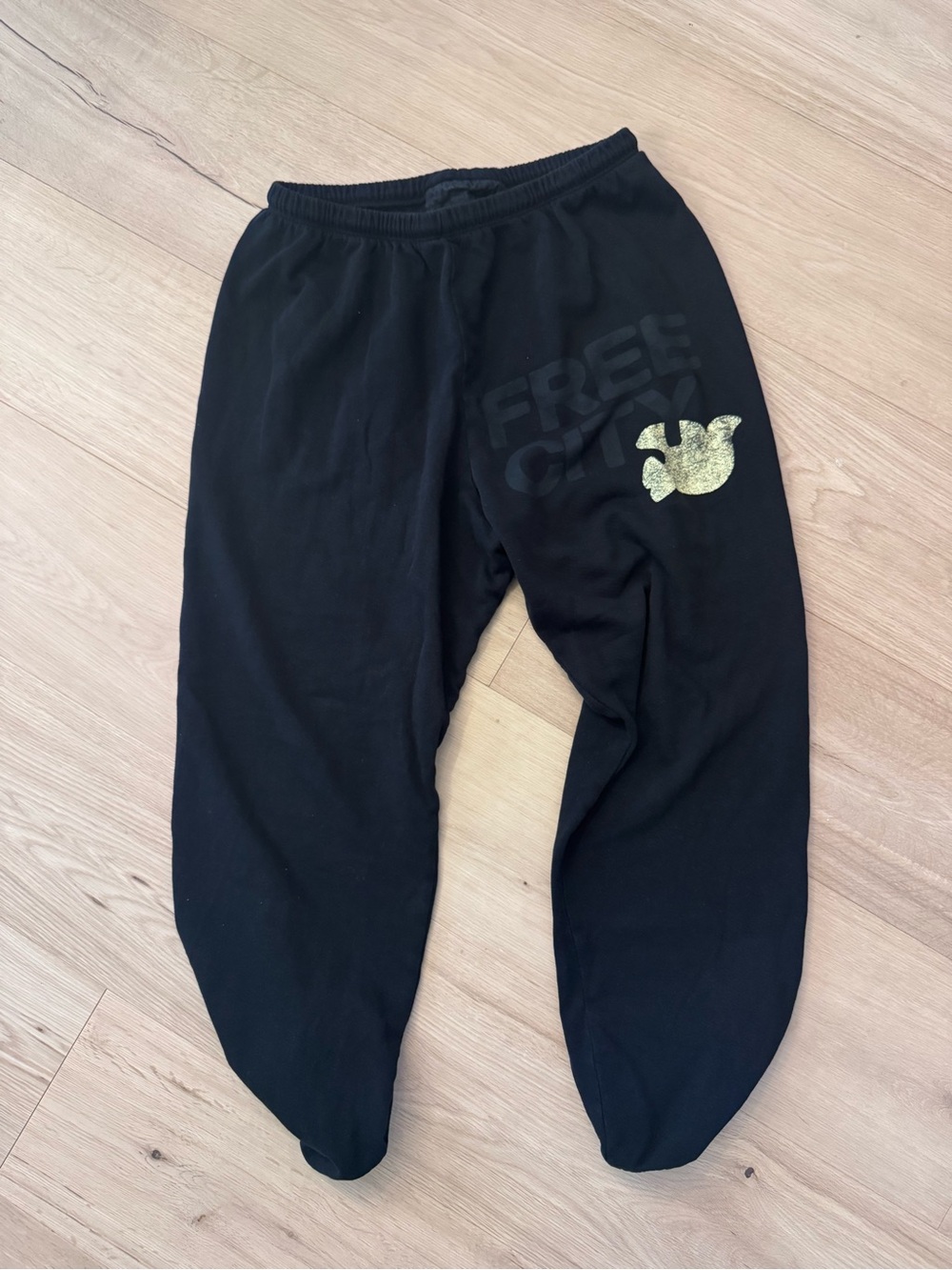 freecity Black Joggers with Gold Dove and Logo